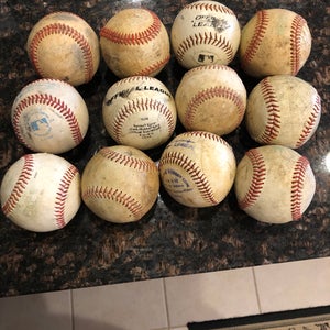 One dozen Used baseballs
