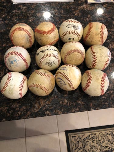 One dozen Used baseballs