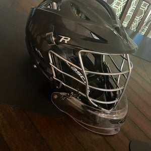 Black lacrosse goalie helmet with throat guard cascade r