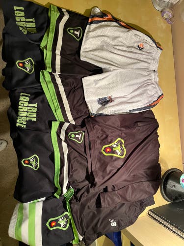 large bundle of true lacrosse shorts