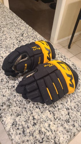 Used CCM 4R Lite Gloves 14"