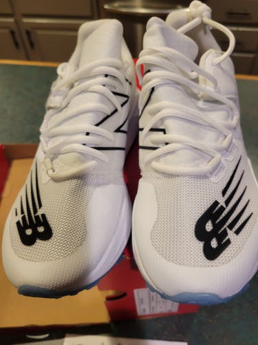 White New Youth Kid's New Balance turf shoes