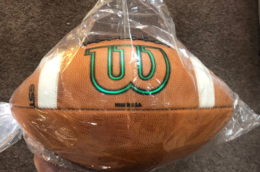 Wilson GST football W/green graphics