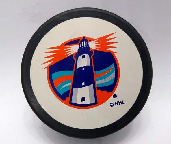 New York Islanders Lighthouse Logo Souvenir NHL Hockey Puck Trench