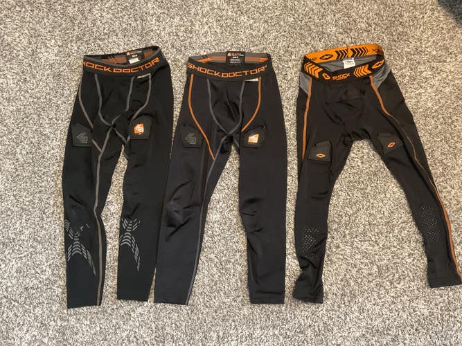 3 total leggings (1 medium, 2 small). Black Used Boys Compression leggings Shock Doctor