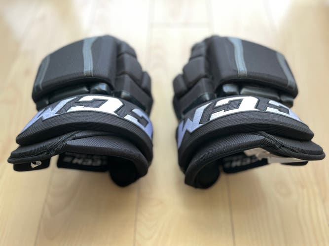 Used Black 13" CCM HGCLPP Pro Stock Gloves (Crazy Lite Plate Protection)