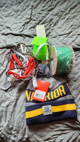 Spool of string, beanie, shooters