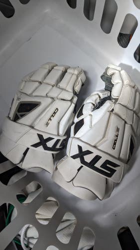 Used STX Cell IV Lacrosse Gloves large