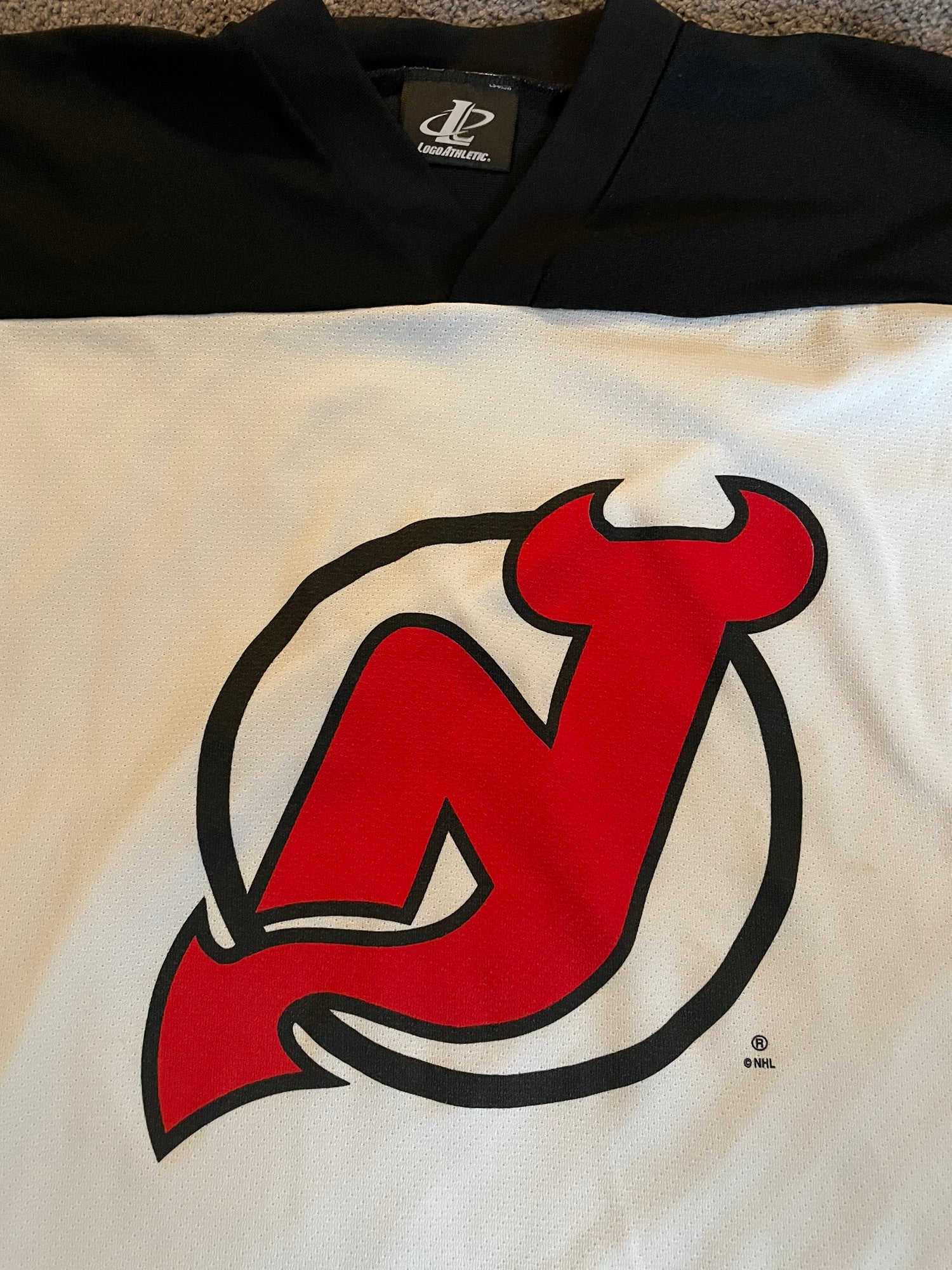 VINTAGE NJ DEVILS BLACK/RED STARTER JERSEY - Primetime