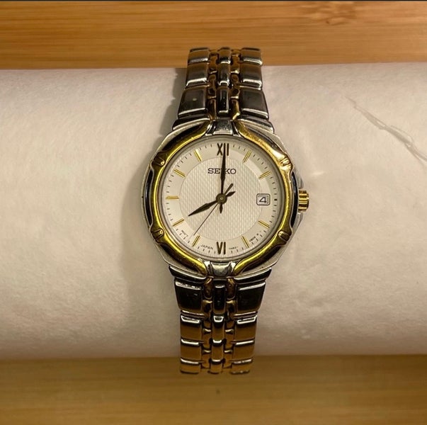 seiko gold and silver tone watch - needs battery | SidelineSwap