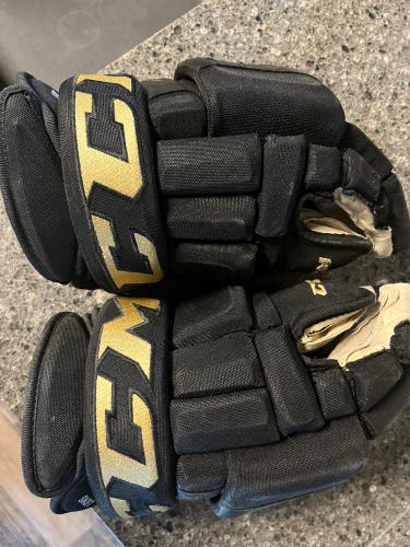 Used CCM 14" Pro Stock Tacks 4 Roll Pro Gloves