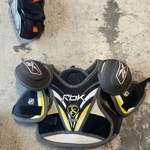 Used Small Reebok SC87 Shoulder Pads