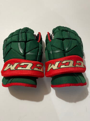 used CCM 14" Pro Stock HG12 Gloves minnesota wild