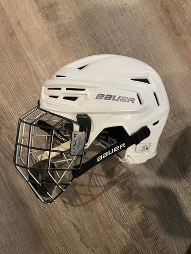 Used Medium Bauer Re-Akt 150 Helmet with Cage