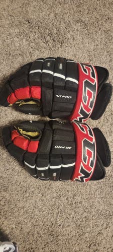 Used CCM Tacks 4 Roll Pro Gloves 14"