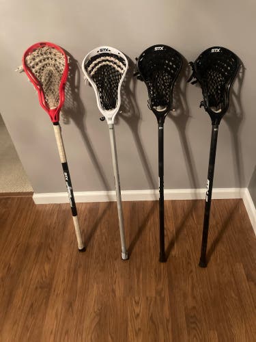 4 STX LACROSSE STICKS.
