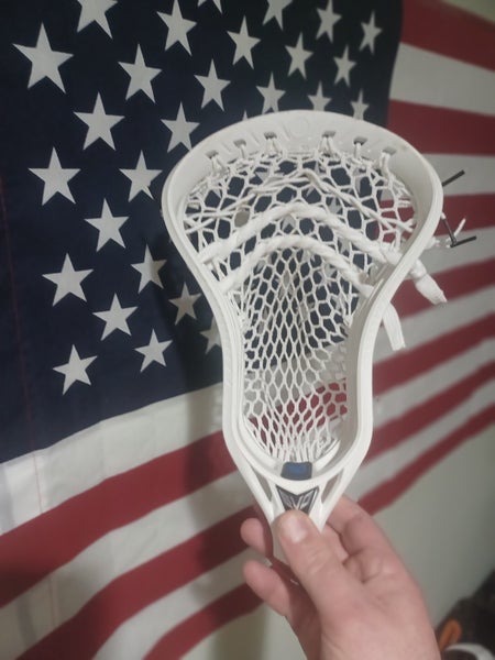 Warrior Evo 5 (Like New) strung by a lax-stringer, not factory