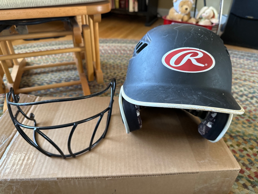 Rawlings batting helmet with cage Size 6 1/2-7 1/8