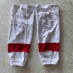 White practice hockey socks with red stripes