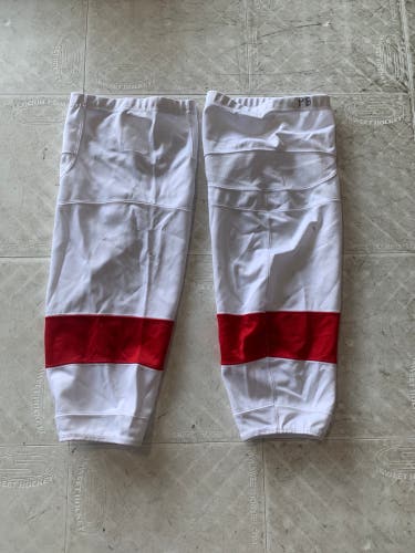 White practice hockey socks with red stripes