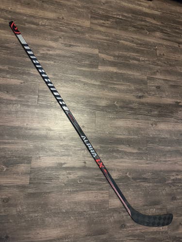 Warrior P28 Pro Stock Covert QR5 Pro Hockey Stick with Red LX Pro Graphics