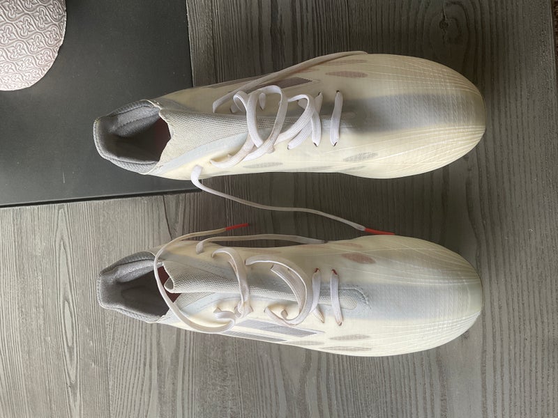 White Used Men's Size 11 (Women's 12) Molded Cleats Adidas X speedflow Cleats