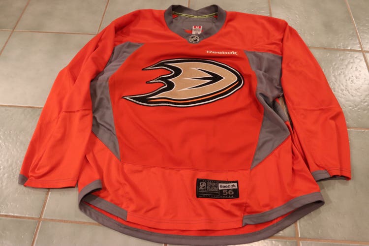 RARE -- Pro Stock Used Anaheim Ducks Orange Practice Jersey Size 56