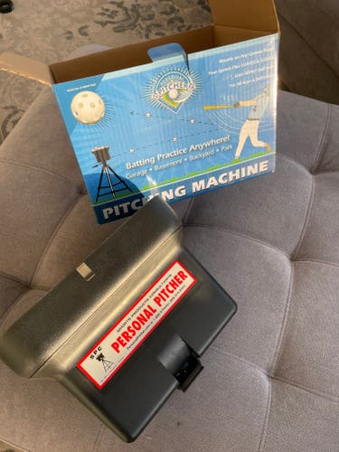 Brand new - never used. Pitching Machine