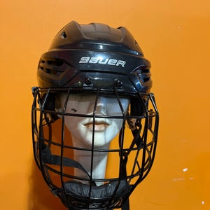 Used Black Bauer Re-AKT 95 Helmet & Cage Combo believed to be medium