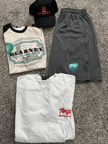 BUNDLE of Lacrosse gear including under armour shorts and hat