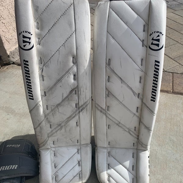 Used 28" Warrior Ritual G4 Goalie Leg Pads