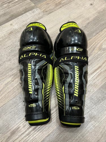 Used 12" Warrior Junior Hockey Shin Pads
