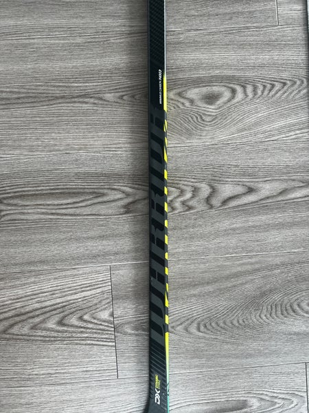 Used Right Handed Warrior Alpha DX Grip Hockey Stick - 65 Flex - W16 pattern