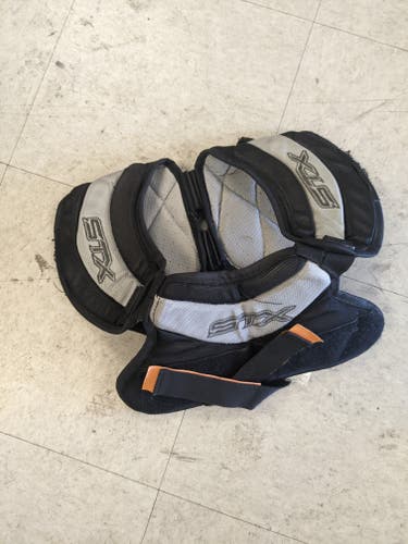 Used Adult Large STX Shoulder Pads