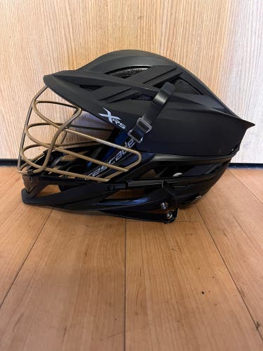 New Black Player's Cascade XRS Helmet With Gold Cage