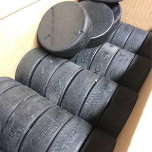 50 Used Hockey Pucks