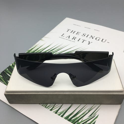 Trendy Rimless Futuristic Wrap Around Sunglasses Cyberpunk Visor Sunglasses