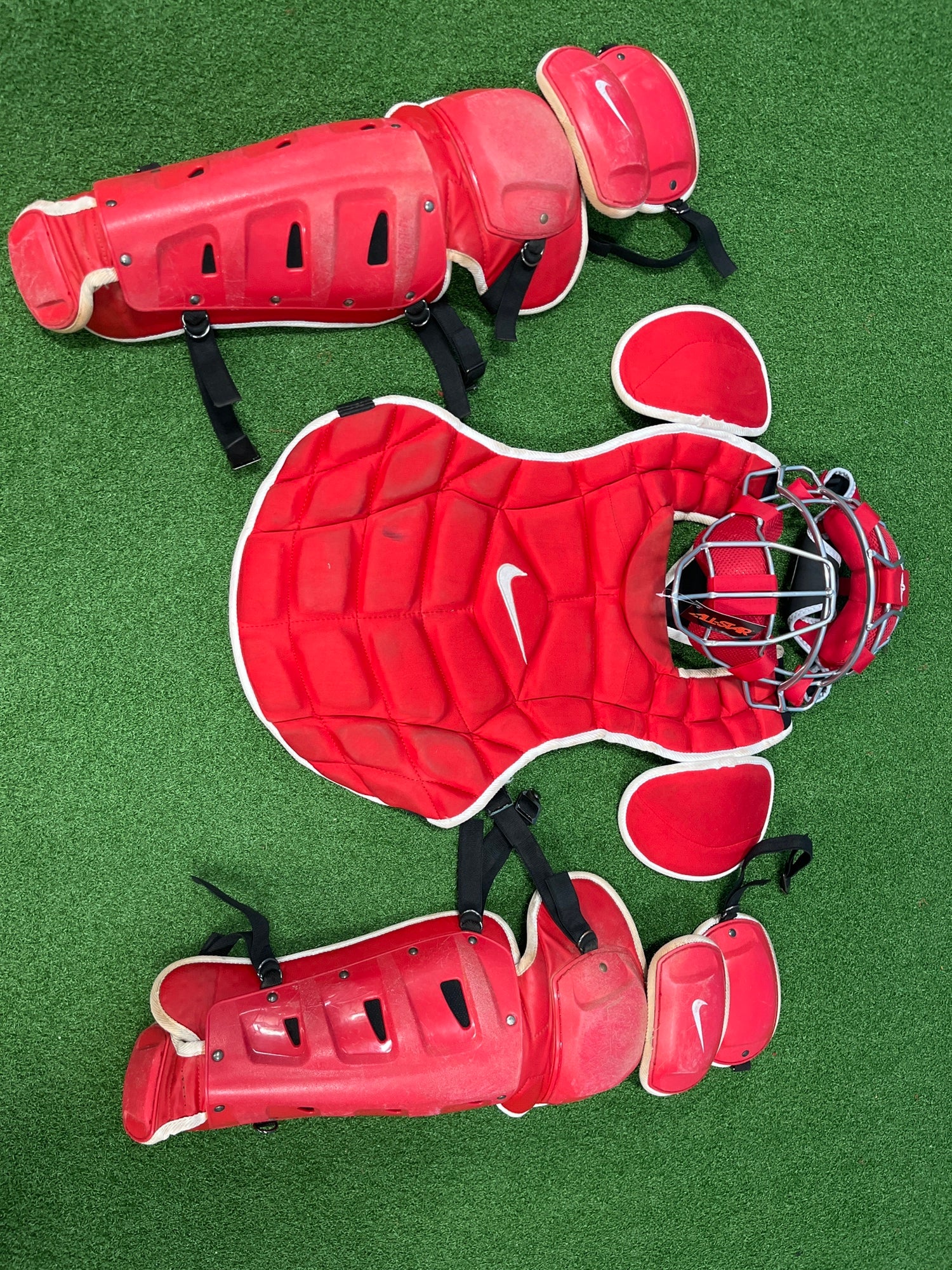 College issued red/grey Nike catchers gear