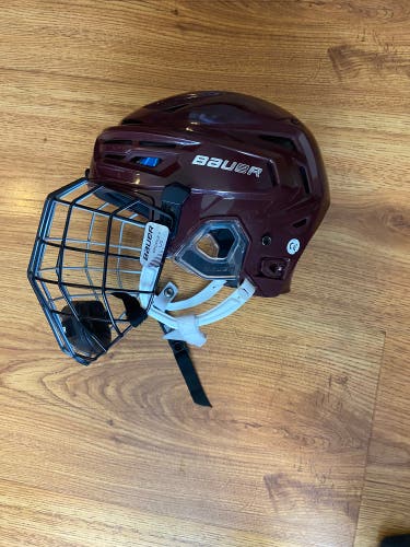 Used Large Bauer Re-Akt 150 Helmet