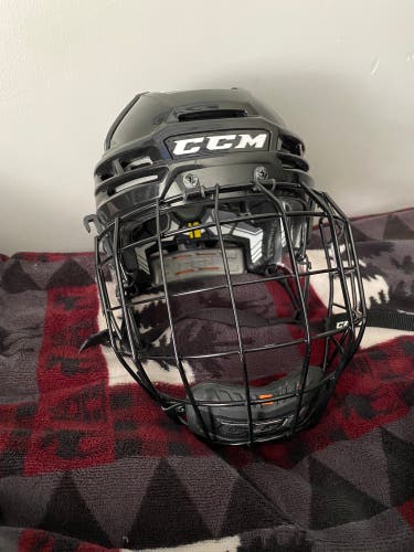 Used Medium CCM  Tacks 910 Helmet