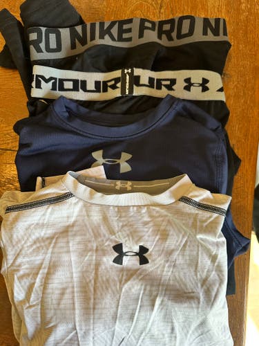 Nike Pro and UA Youth Small thermal shirts and compression pants