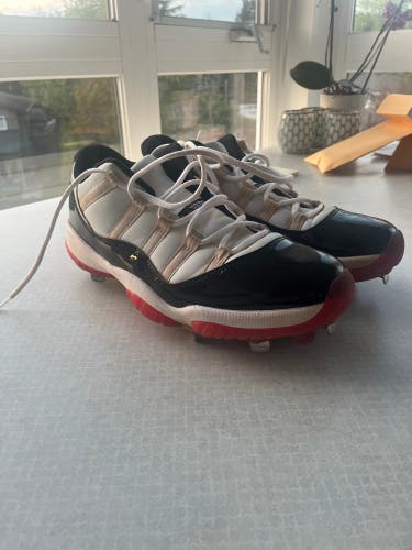 Air Jordan 11 Lows black and red converted to cleats