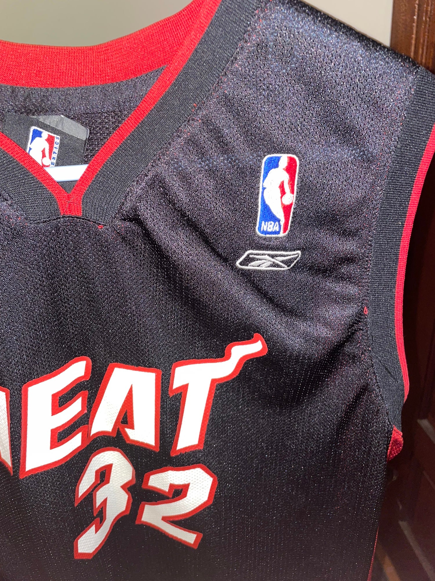NBA - Shaquille O' Neal's #32 goes into the Miami Heat