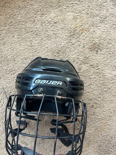 Used Large Bauer Re-Akt 100 Helmet