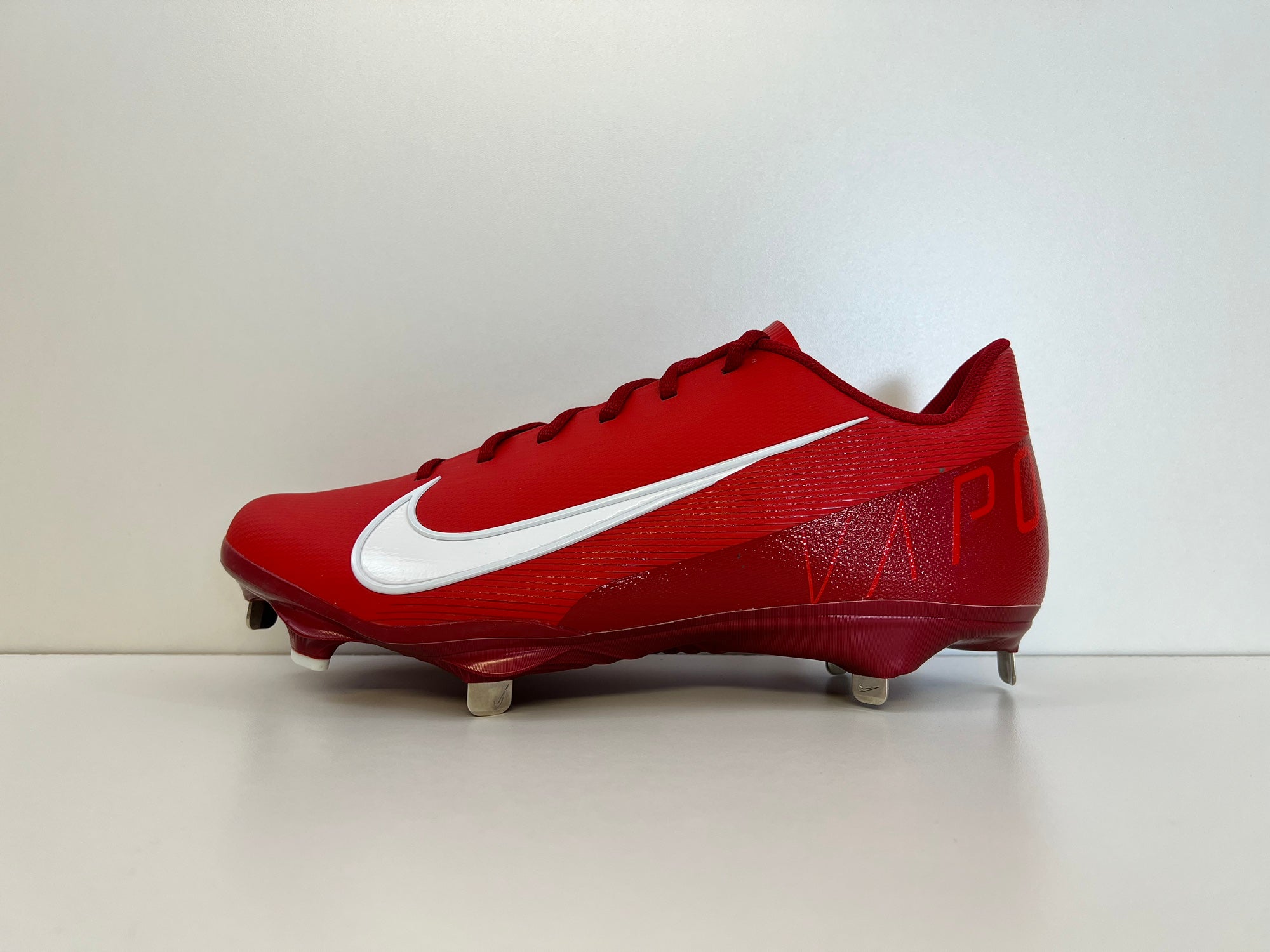 red nike baseball cleats