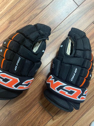 Used CCM 14" Tacks 4 Roll Pro Gloves