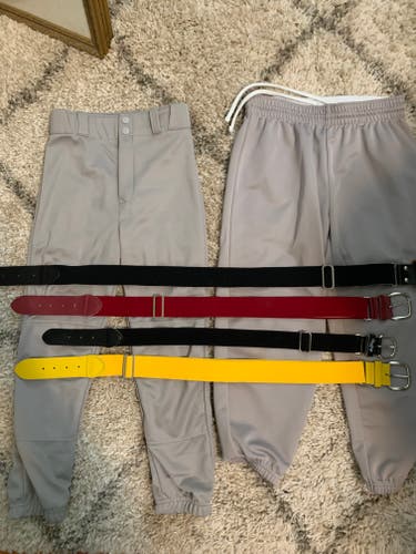 Gray Youth Used Medium Champro Game Pants with various colored game belts