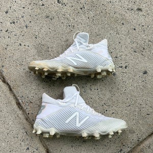 Used Men's 10.5 Molded New Balance Freeze Mid Top Cleats