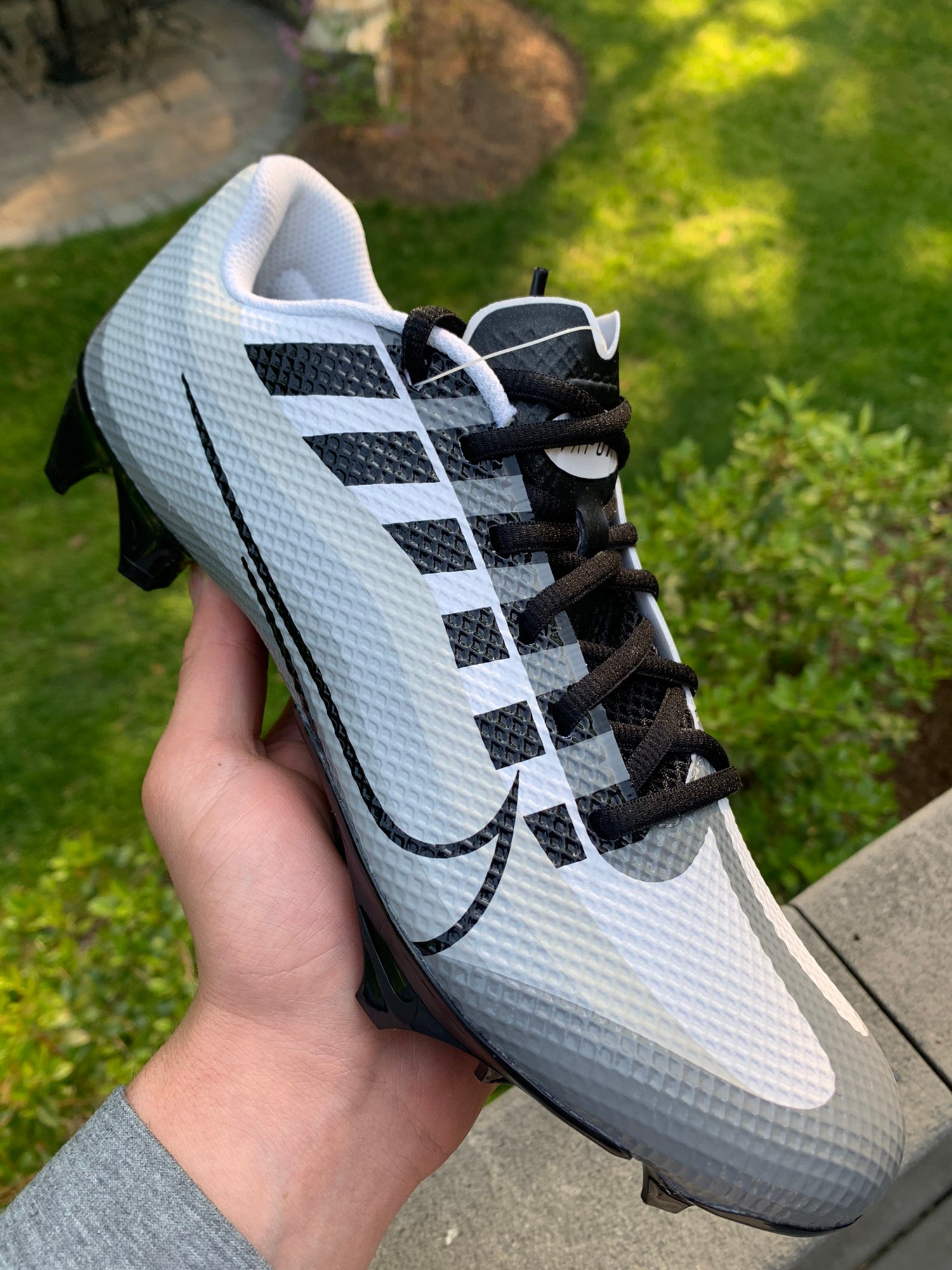 gray football cleats