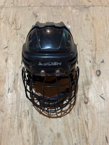Used Medium Bauer  Re-Akt Helmet
